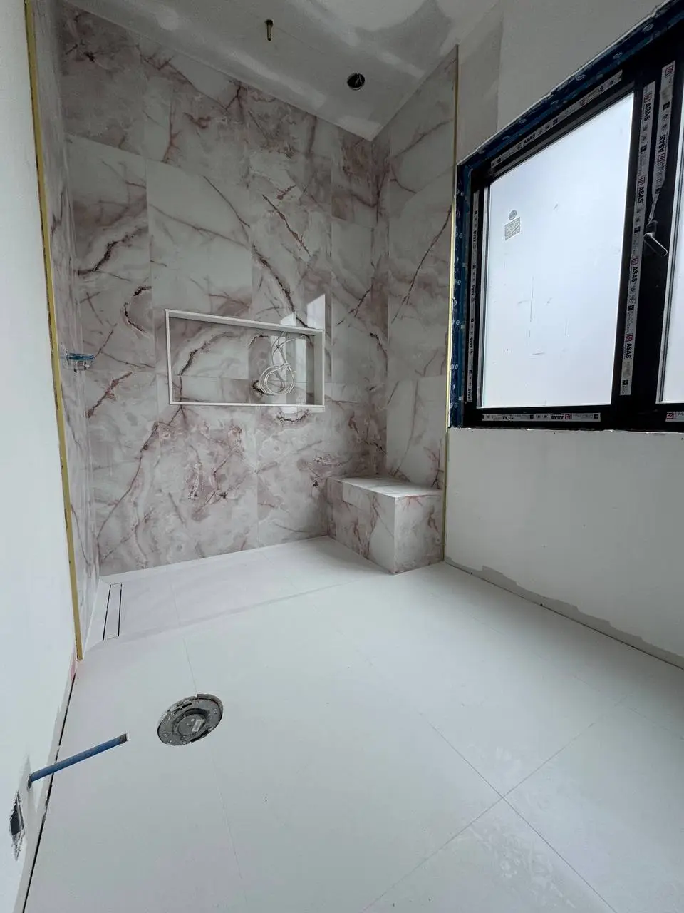 Bathroom wall tile installation with vanity area in Toronto